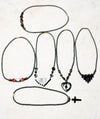 SIX PIECE INDIVIDUAL MULTI-COLOURED HEMATITE AND SAMBALA STONE NECKLACES