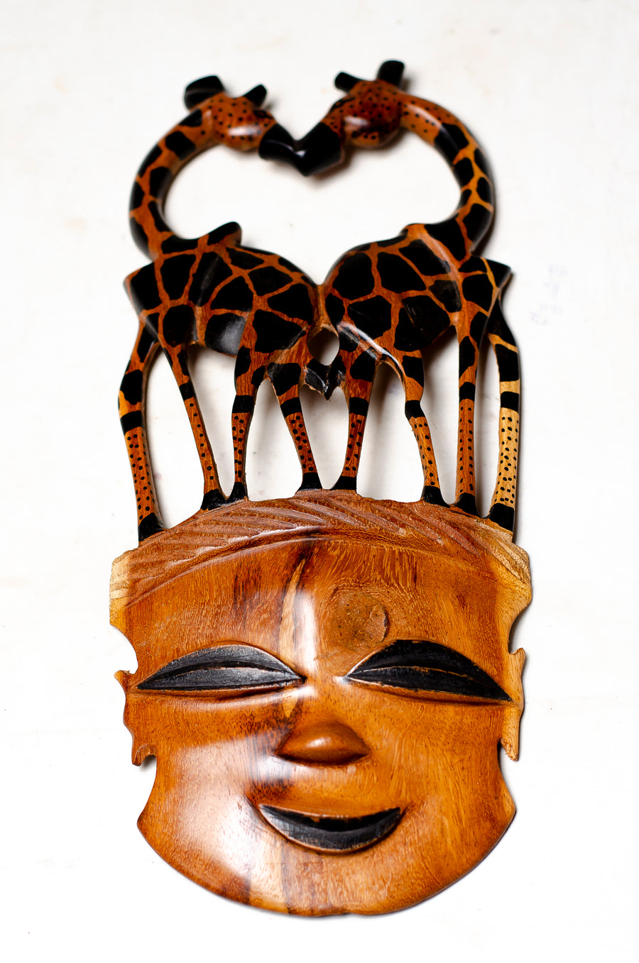 kissing giraffe teak wood mask