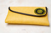 yellow clutch bag