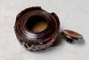 open wooden engraved sugar bowl