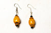 round wooden carved earrings