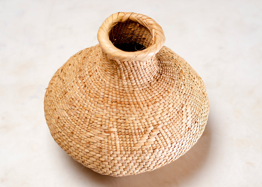THE WOVEN TWINE CALABASH MADE OUT OF GRASS