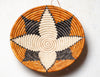 woven basket with star design