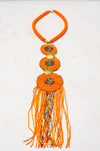 orange tasseled beaded necklace